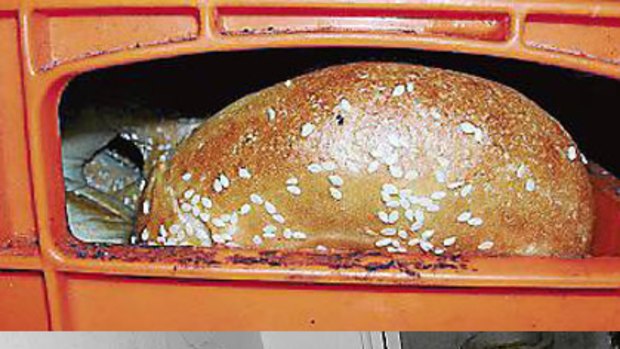 Reprehensible ... bread in a storage container (above) and a basin at the "filthy and unhygienic" Marrickville bakery.
