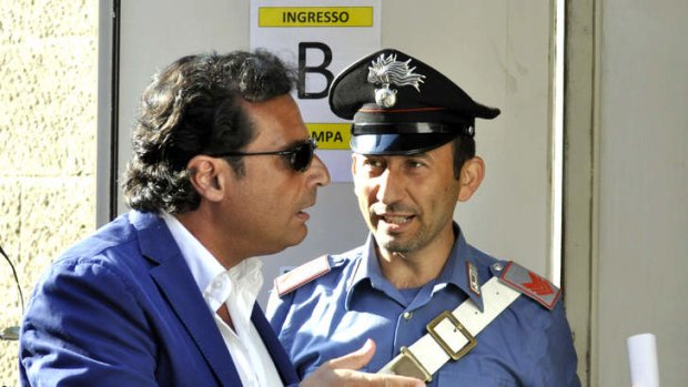 Captian Francesco Schettino arrives for his trial in Grosseto, Italy.