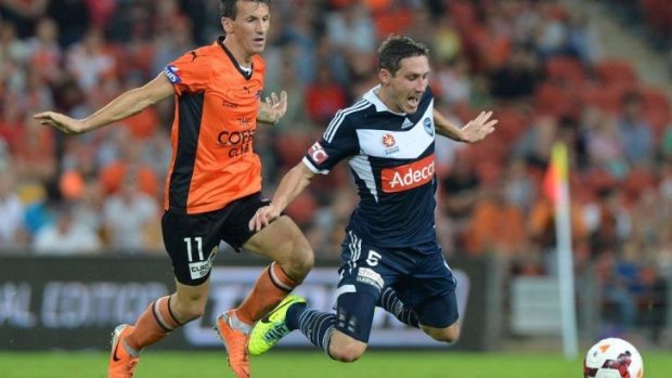 The Roar’s Liam Miller was  penalised for this challenge on Victory’s Mark Milligan.