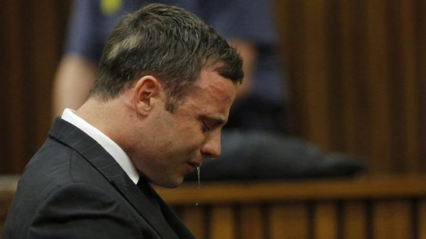 'Not guilty' ... Oscar Pistorius reacts as he listens to Judge Thokozile Masipa's judgement at the North Gauteng High Court in Pretoria.