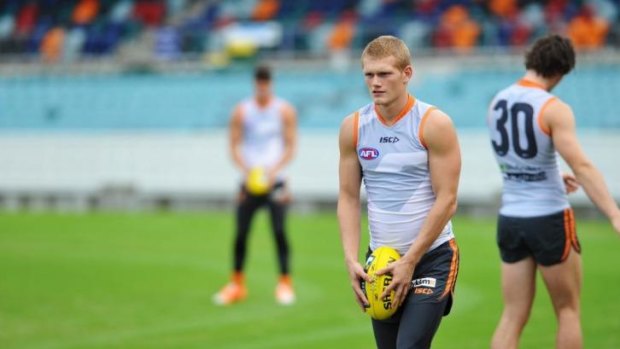 Recent performance sets precedent for the season: Midfielder Adam Treloar training with the Giants.