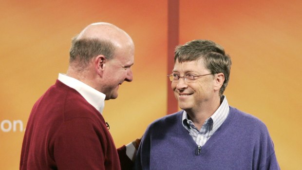 Bill Gates, right, shakes hands with Microsoft CEO Steve Ballmer, after Gates announced in 2006, he would exit from day-to-day responsibilities to concentrate on the charitable work. File