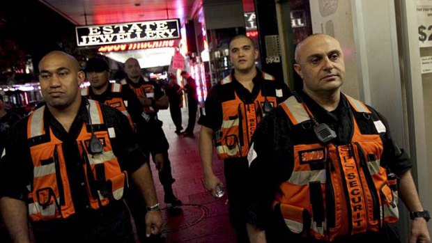 Rapid response team ... Nick Constantin (right) and members of his private security firm on their Friday night patrol.