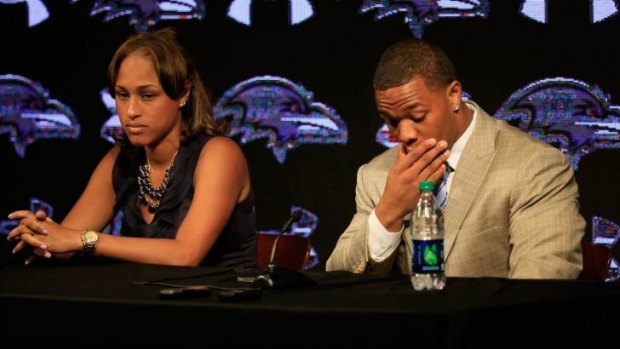 Standing by her man ... Ray Rice with his then fiancee Janay at a media conference in May.
