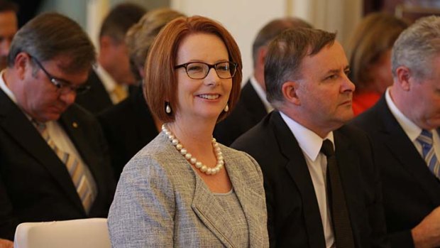 Prime Minister Julia Gillard and Anthony Albanese at the swearing-in ceremony at Government House on Monday.