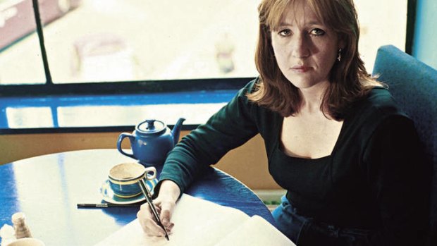 Where it began … Rowling re-creates her cafe-based writing technique for the cameras in 1999.