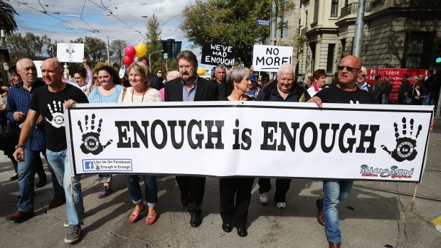 The Enough is Enough rally marched from Treasury Gardens to Parliament House to demand that the State Government amend its bail and sentencing laws.