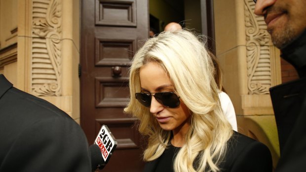 Oliver Curtis' wife Roxy Jacenko leaves court after her husband was jailed.