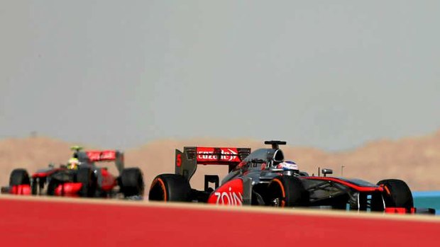 Sergio Perez, left, and his McLaren teammate Jenson Button battle for position at the Bahrain Grand Prix.