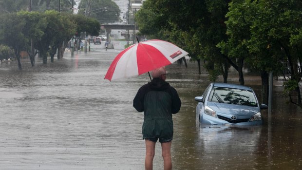 Rain from ex-cyclone Debbie floods Newmarket on March 30.