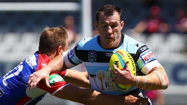 Cronulla captain Paul Gallen makes a break during the match against the Newcastle Knights in the Auckland Nines at Eden Park on the weekend.