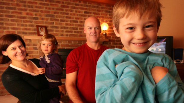 Lisa and Bruce Benning with their children Kira, 2, and Jackson, 5. The siblings' cystic fibrosis makes them prone to more serious consequences if they get the flu.