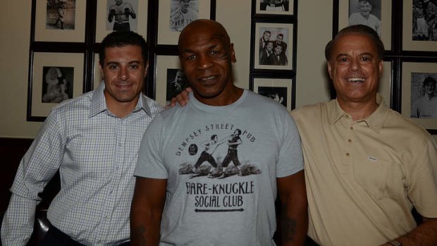Aaron Gomes with Mike Tyson and his Mob-fighting dad Dennis.