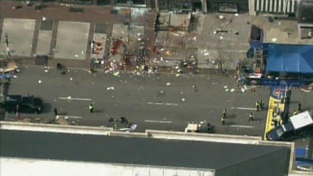 A still image taken from NBC TV footage shows the site of one of the blasts from above.