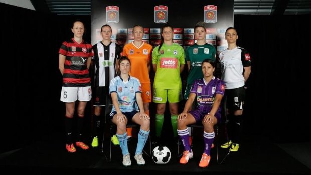 From left to right, at the W-League season launch: Western Sydney's Rachael Soutar, Newcastle's Emily van Egmond, Sydney's Amy Harrison, Brisbane's Kim Carroll, Melbourne Victory's Brianna Davey, Canberra's Michelle Heyman, Perth's Samantha Kerr and Adelaide's Melissa Barbieri.