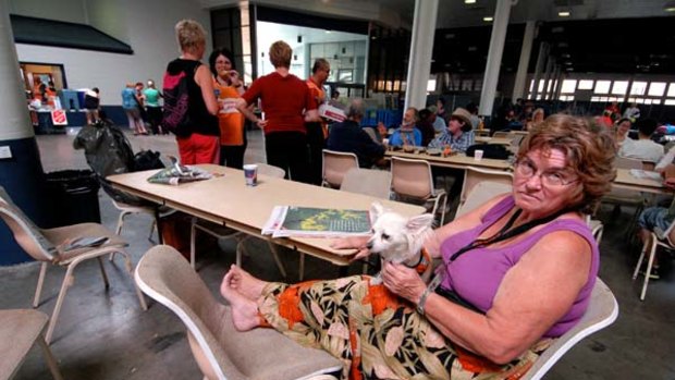 Stranded ... Marie Holswilder came to Brisbane from Townsville to buy a vehicle; now she is sleeping in it at the showgrounds.