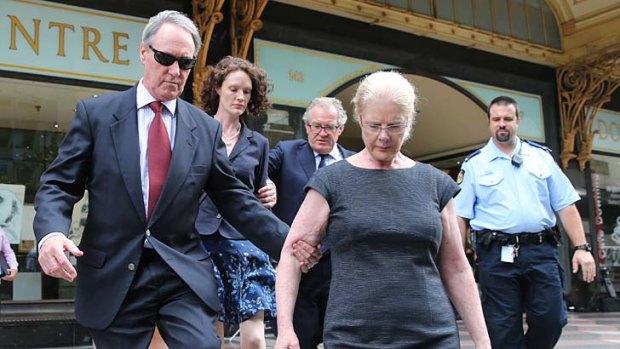 Support: Robert Hughes leaves court with wife Robyn Gardiner and daughter Jessica.