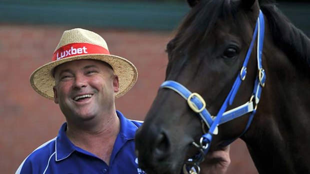 Laughing: Trainer Peter Moody with Black Caviar.
