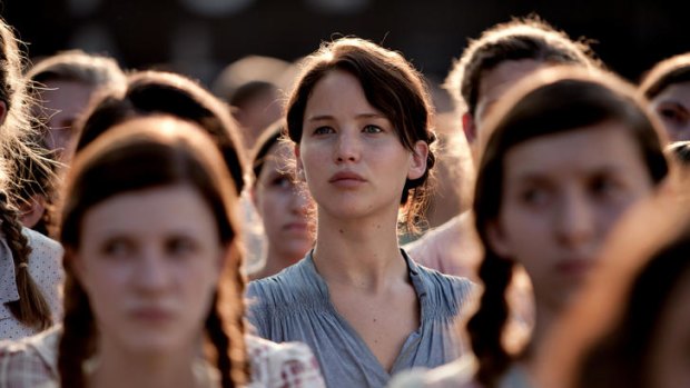 Jennifer Lawrence (centre) as Katniss Everdeen in <i>The Hunger Games</i>.