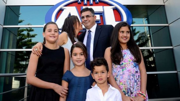 Family man: Andrew Demetriou with wife Symone and children (from left) Alexandra, Mattea, Sacha and Francesca.