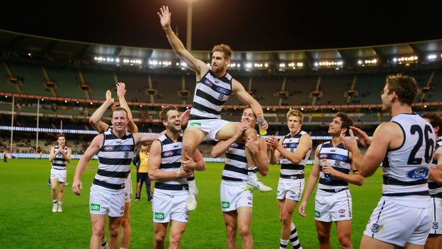 MELBOURNE, AUSTRALIA - MAY 08:  Tom Lonergan of the Cats is chaired from the field after playing his 150th match during the round six AFL match between the Collingwood Magpies and the Geelong Cats at Melbourne Cricket Ground on May 8, 2015 in Melbourne, Australia.  (Photo by Scott Barbour/Getty Images)