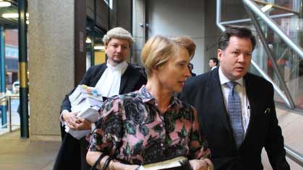 Down but not out .. trainer Gai Waterhouse leaves the Supreme Court yesterday after losing her case.