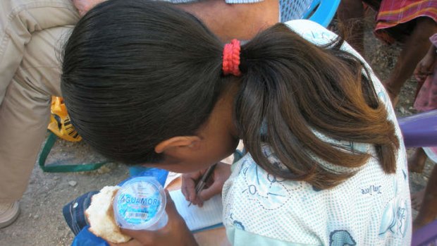 Testing times: an Indonesian schoolgirl.