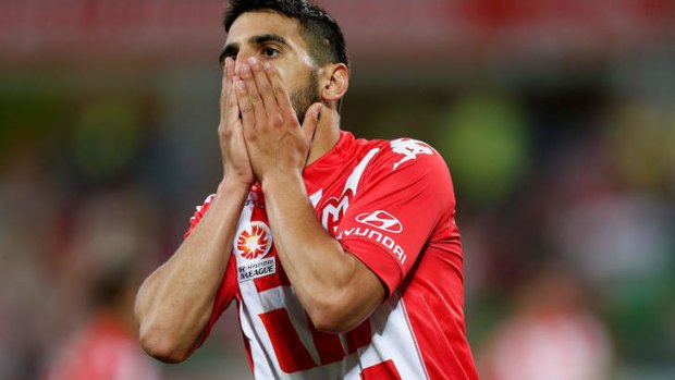 Aziz Behich reacts after missing a chance.