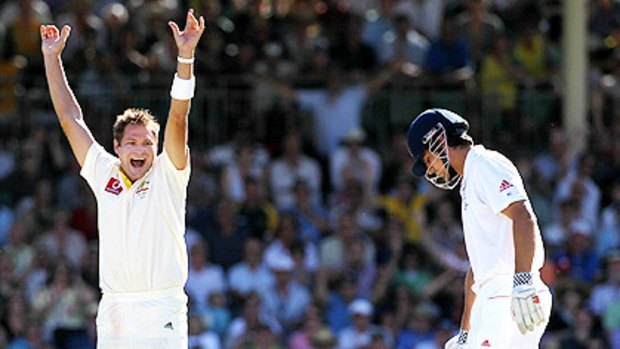 Australian paceman Ryan Harris rejoices after dismissing England opener Alastair Cook lbw for 13 last night.