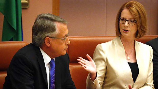Looking for a boost: Wayne Swan and Julia Gillard.