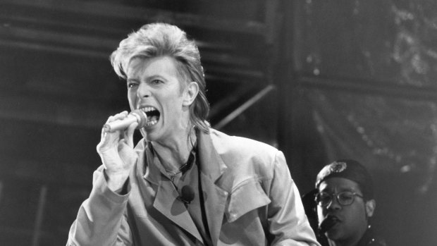 David Bowie performing during a concert at the Reichstag.