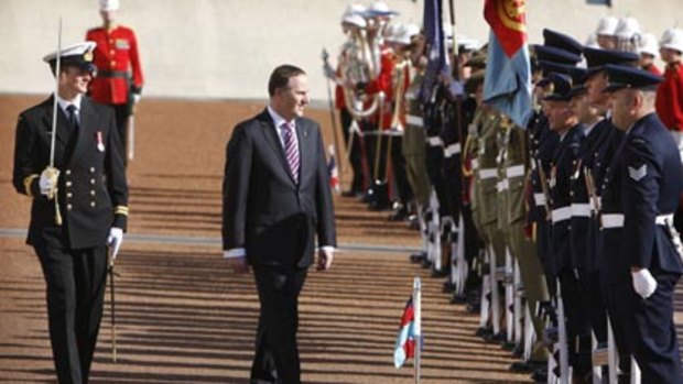 Ceremonial welcome...the New Zealand Prime Minister, John Key, arrives at Parliament House in Canberra yesterday.