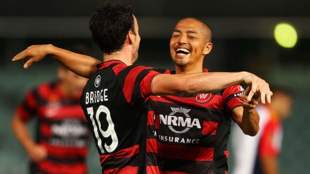 Happy Wanderers: Striker Mark Bridge (left) and Shinji Ono will be refreshed for Western Sydney's clash with Melbourne Victory on Tuesday night.