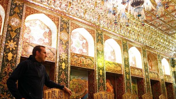 Green and gold ... Socceroos goalkeeper Mark Schwarzer inspects a palatial restaurant in the Souq Waqif market in Doha, Qatar, during time out from Asian Cup duties for Australia on Saturday.
