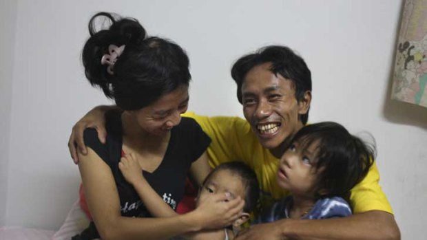 Kham Kap Thang Taithoul and his wife Niang Lam Cing with their son, Hau Muon Khai, 2, and daughter, Cing San Lun, 4.