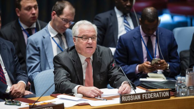 In this photo provided by the United Nations, Russia's U.N. Ambassador Vitaly Churkin address a security council meeting on Syria in 2016. 