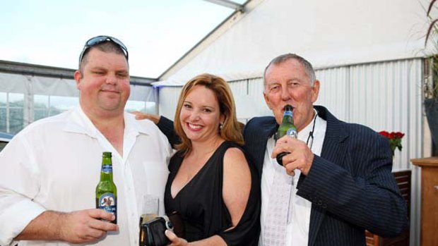 Eye on the throne ...  the mining magnate Nathan Tinkler with his wife, Rebecca,  and John Singleton.