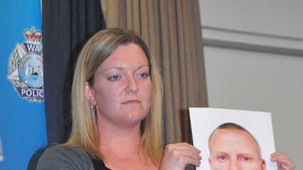 Diana Blenkinsopp holds a photo of her missing husband David.