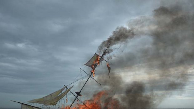 More than words ... a burning ship is among the affecting imagery in Dinh Q. Le's <i>Erasure</i>.