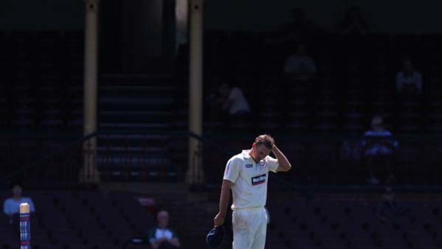 Less than economical ... NSW spinner Nathan Hauritz conceded 57 runs in nine overs on the first day of the Blues' Sheffield Shield match against Victoria at the SCG yesterday.