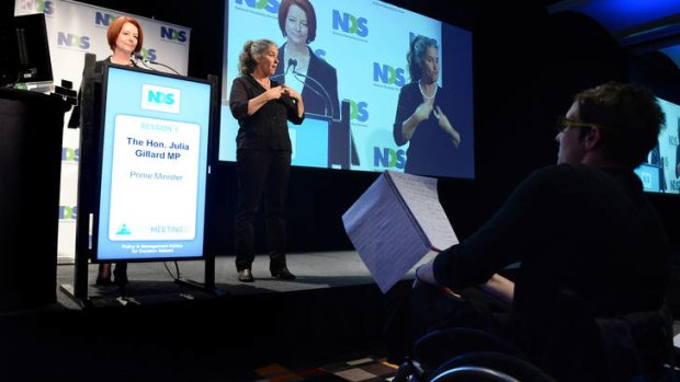 Mel Leckie (right) questions the Prime Minister Julia Gillard (left) during her speech.