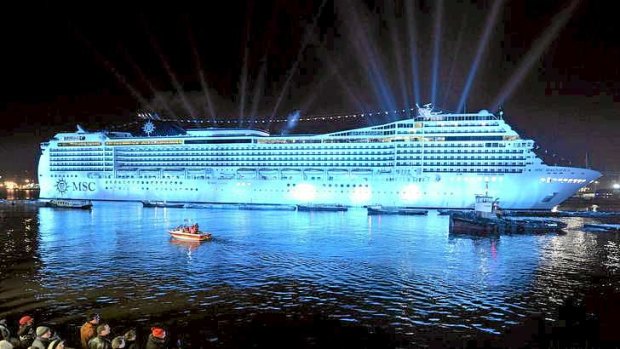 A lights show illuminates the night during the naming ceremony of cruise ship MSC Magnifica at the Hamburg harbour in 2010.