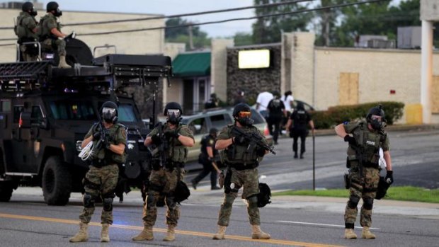 Riot police on the streets of St Louis in the aftermath of Michael Brown's shooting.