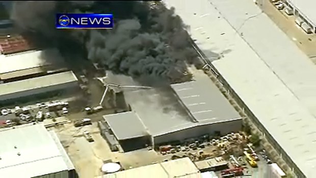 Firefighters continue to battle a large factory fire at an industrial estate at Geebung in Brisbane's north.