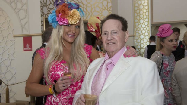 Brynne Edelsten and her husband Geoffrey in the Emirates marquee at Flemington on Melbourne Cup Day.