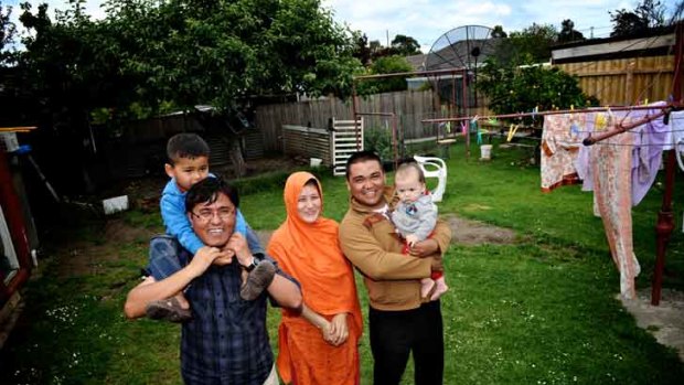 A bridging visa has allowed Mohammad Dostizada (left) to live with nephew Mohammad Taous and his wife, Alia, and their children Shandwar (right) and Zulqarnain.