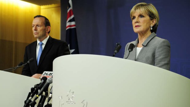 Prime Minster Tony Abbott and Foreign Affairs Minister Julie Bishop at a media conference on the downing of MH17.