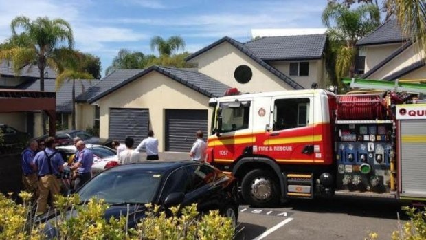 A man was injured and a garage was damaged in a suspected explosion at a home in Robina.