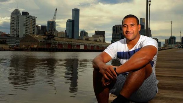 On the dock of the bay ... Melbourne Rebels' recruit Cooper Vuna near his home along the Melbourne Docklands.