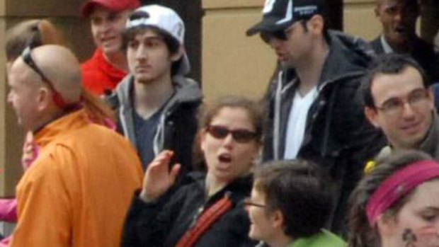 Dzhokhar Tsarnaev, in white hat, and his brother, Tamerlan, approximately 10 to 20 minutes before the blasts that struck the Boston Marathon.
